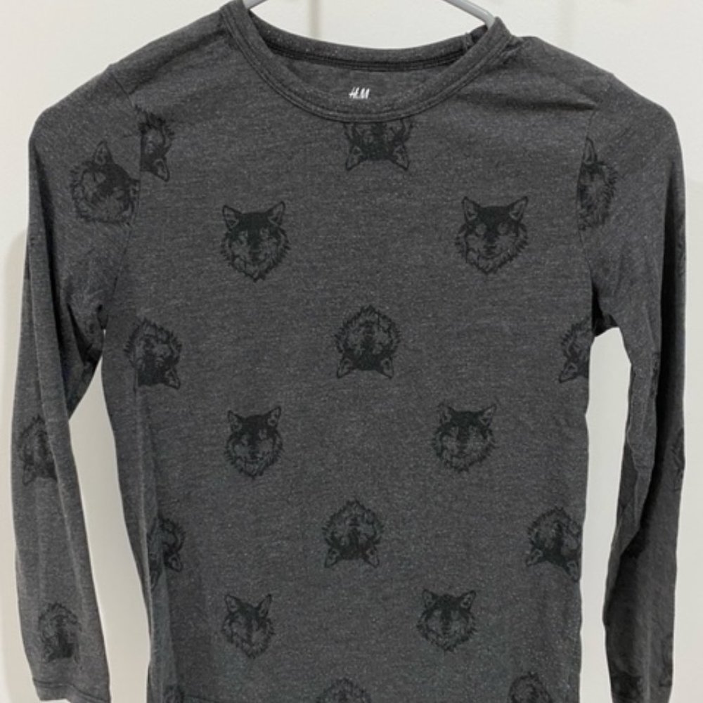 A soft tee with pictures of wolves